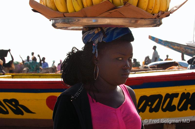 20090529_103336 D300 P1 P1.jpg - Lady selling bananas, Yoff Fishing Village